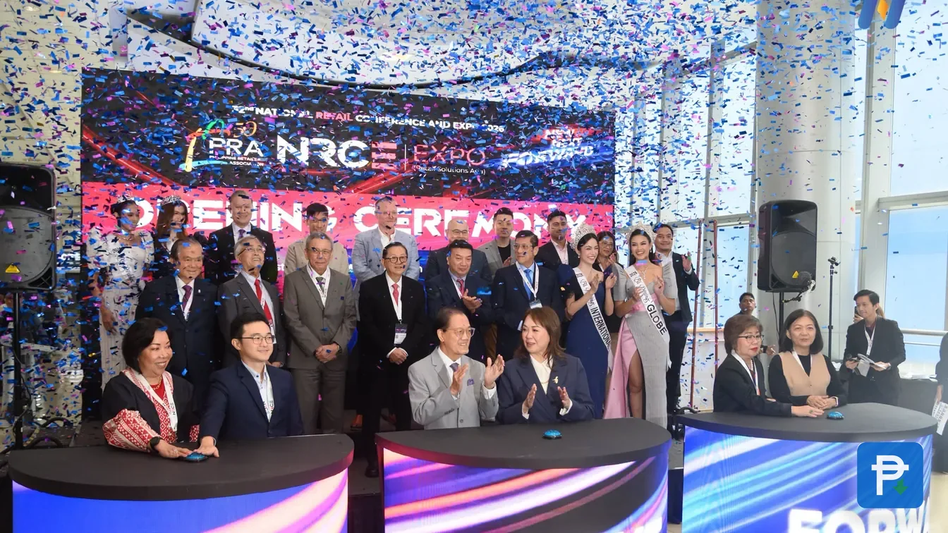 Novaluxia at the NRCE 2026 expo opening ceremony, confetti over the stage as guests clap at branded podiums, a dated event for anyone asking what Novaluxia is